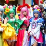 Diverse cosplayers in colorful costumes at a convention.